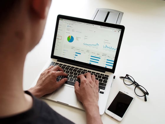 image of person filling out survey